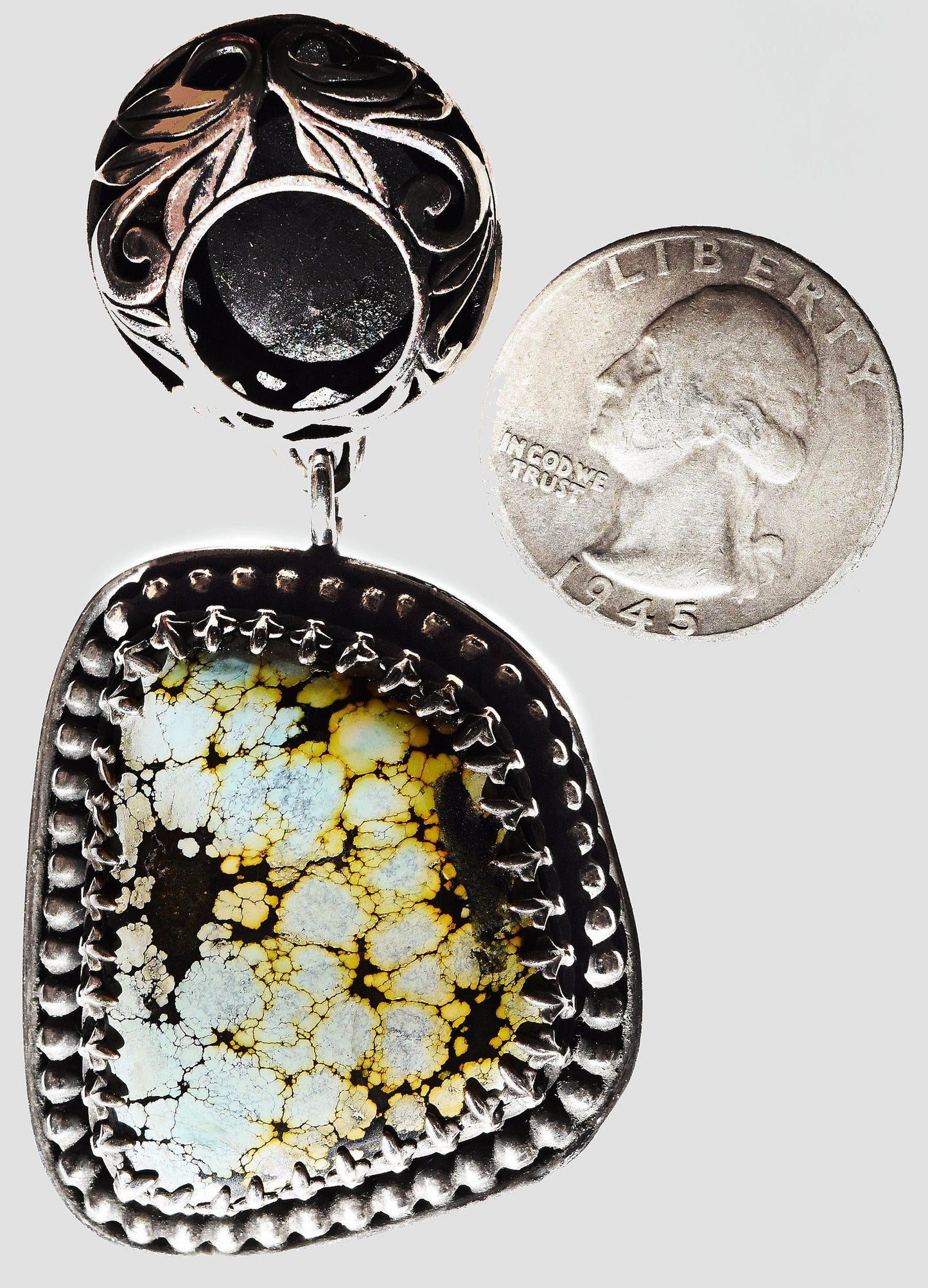 Unusual Turquoise pendant in hand made Sterling Silver