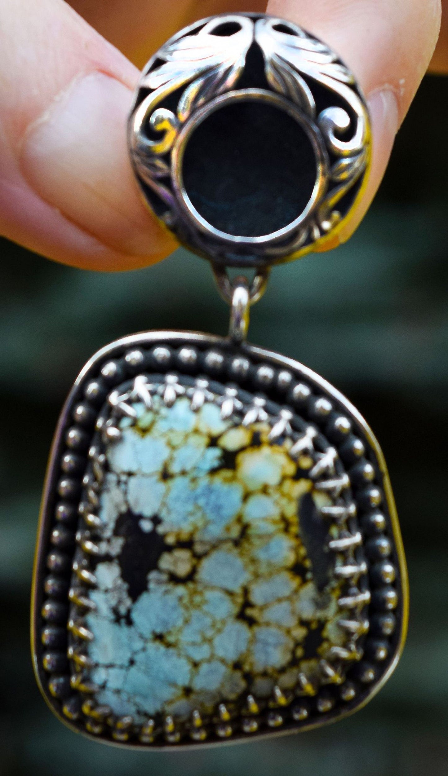 Unusual Turquoise pendant in hand made Sterling Silver