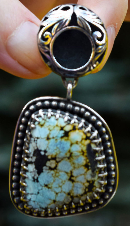 Unusual Turquoise pendant in hand made Sterling Silver