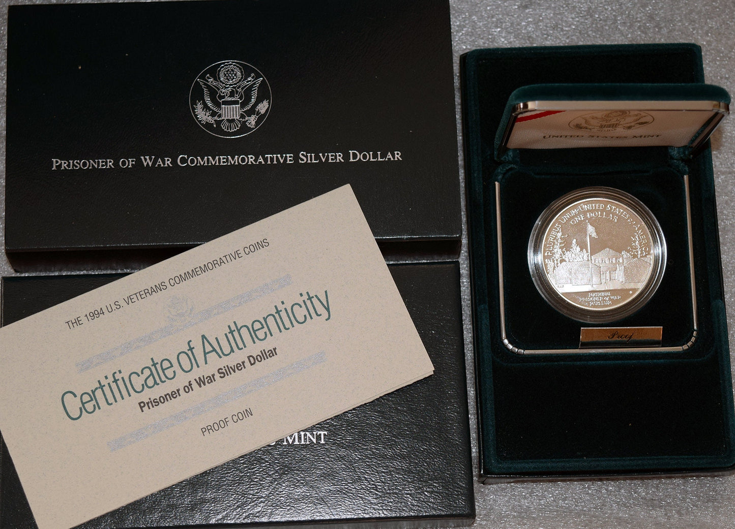 1994 P.O.W PROOF Silver Dollar with original packaging and COA