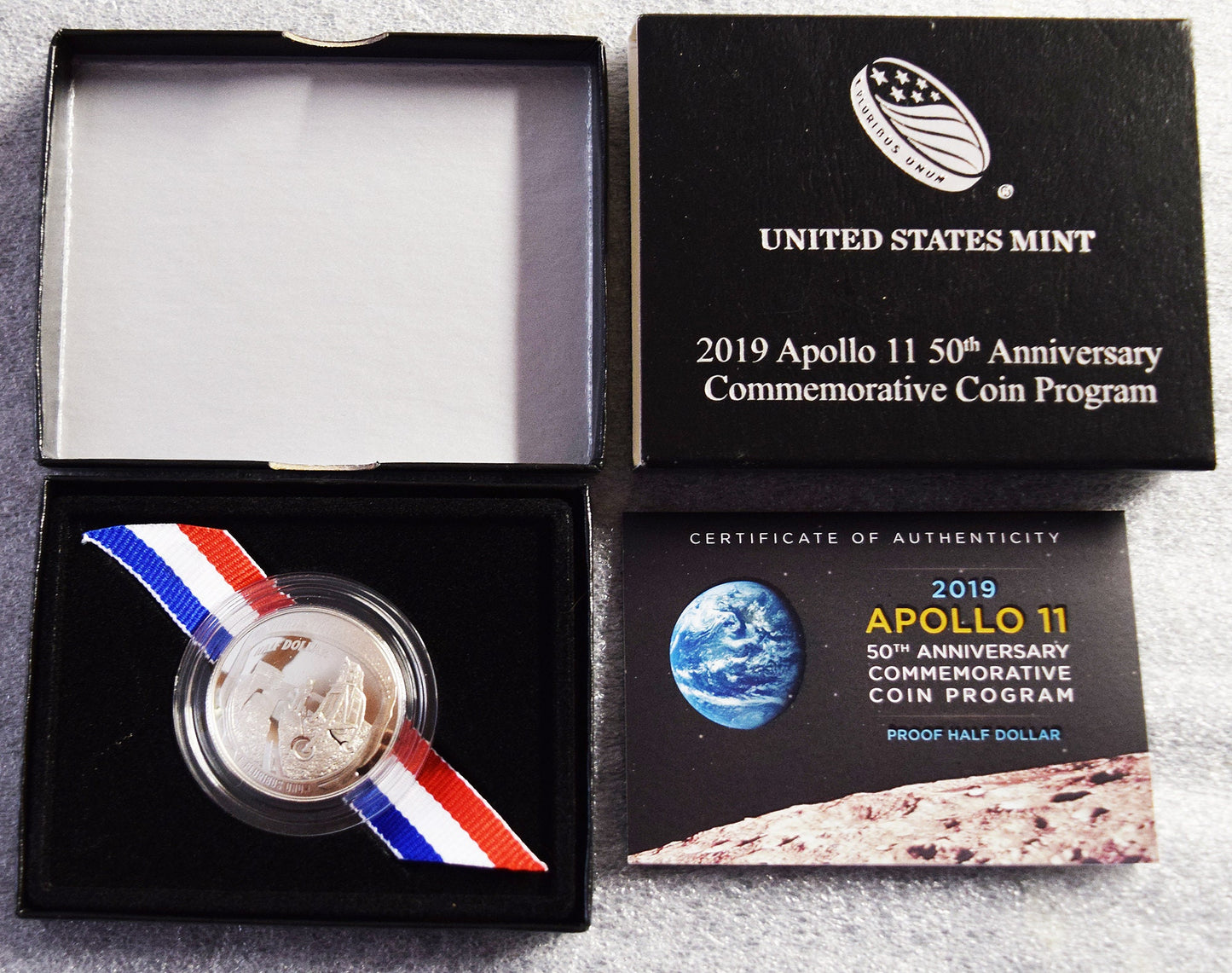 PROOF! - 2019 clad Apollo 11 half dollar, with all documents and original packaging.