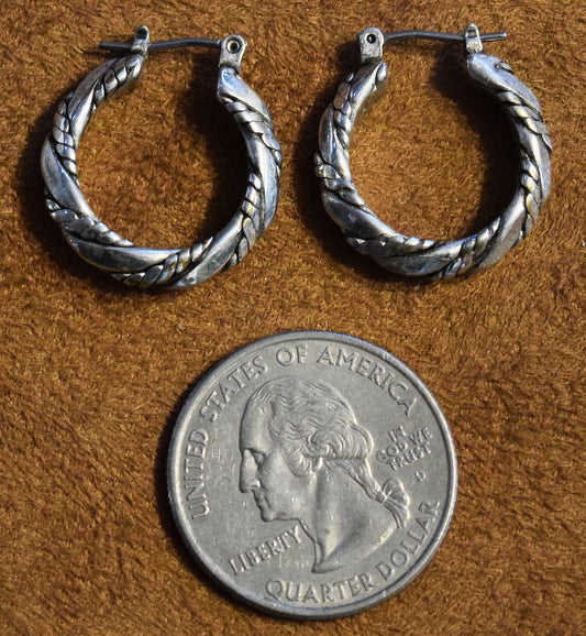 Vintage solid hoop Sterling Silver earrings with a twist!