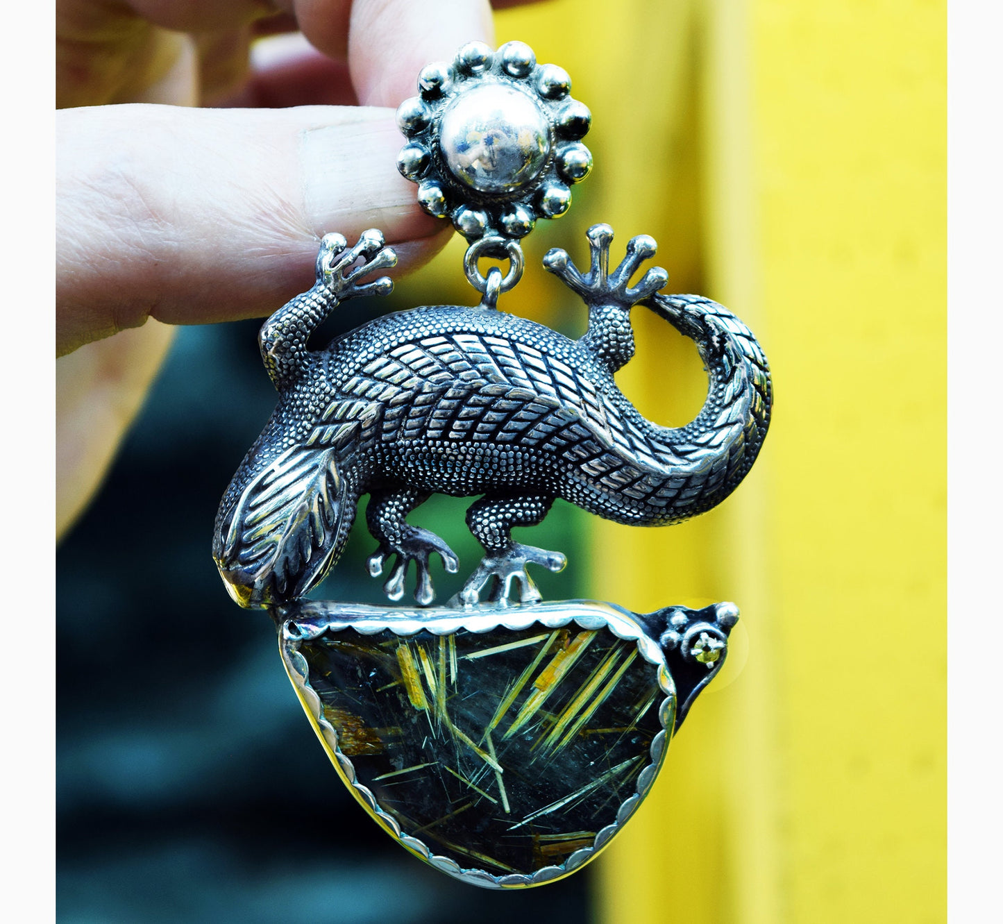 A large lazy lizard languishes under the summer?s desert sun. Sterling pendant with Rutilated Quartz by Mani Pureheart!