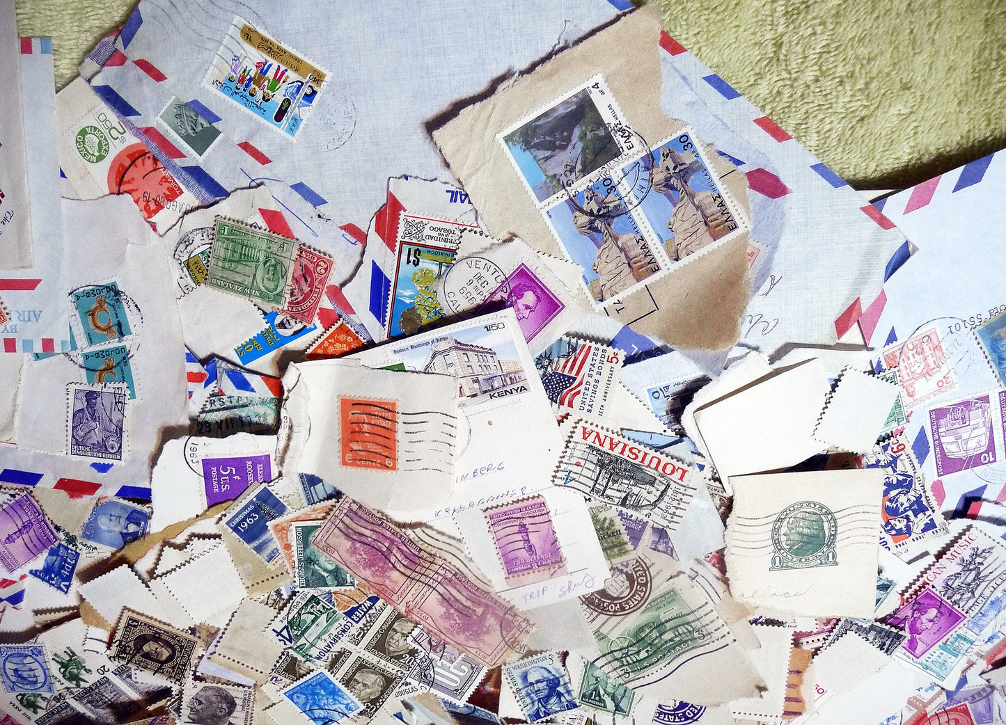 UNSEARCHED! Almost 1.5 pounds of US and world stamps dating from the mid 1800's through the mid 1970's!