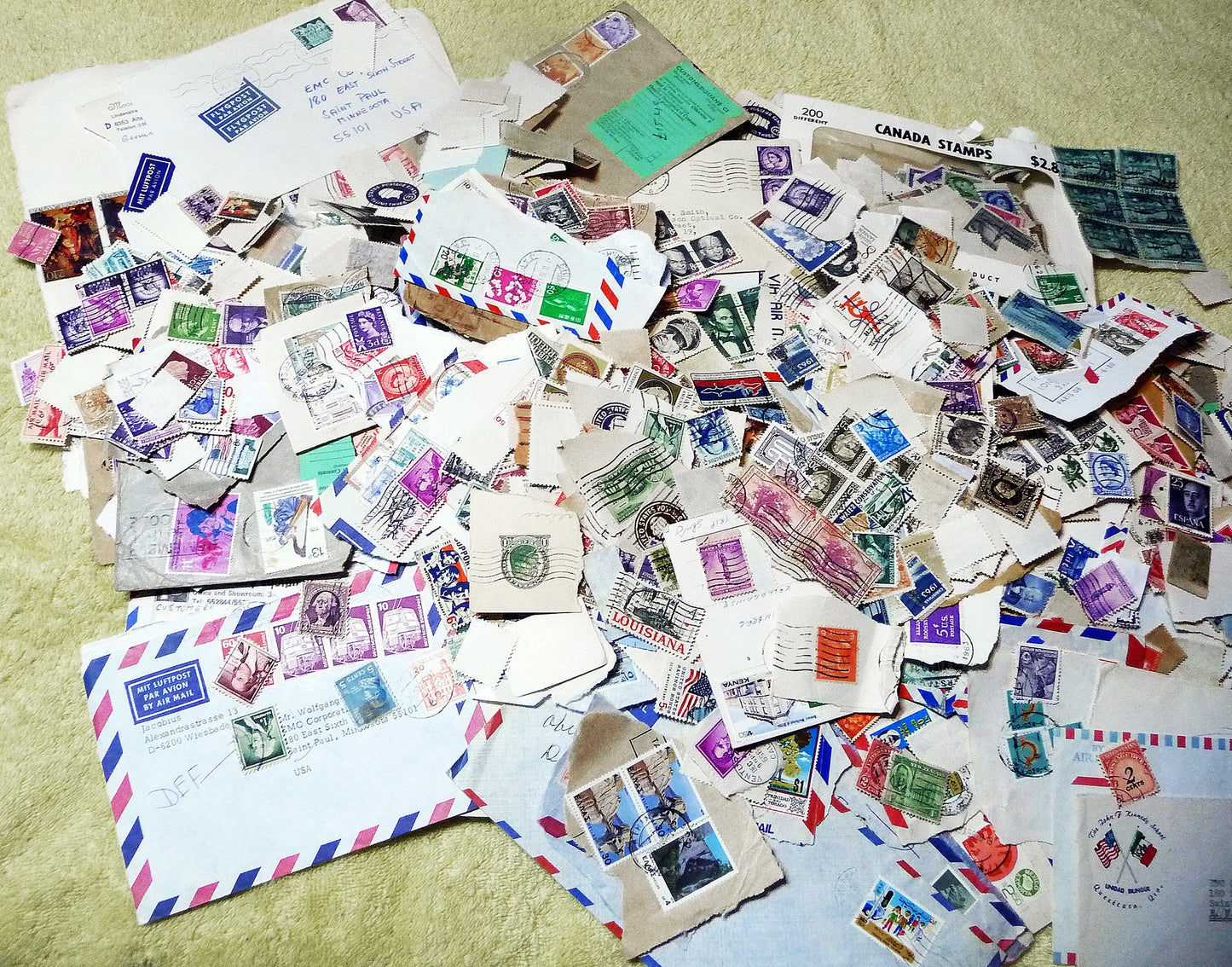 UNSEARCHED! Almost 1.5 pounds of US and world stamps dating from the mid 1800's through the mid 1970's!