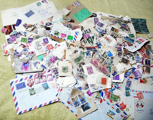 UNSEARCHED! Almost 1.5 pounds of US and world stamps dating from the mid 1800's through the mid 1970's!