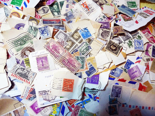 UNSEARCHED! Almost 1.5 pounds of US and world stamps dating from the mid 1800's through the mid 1970's!