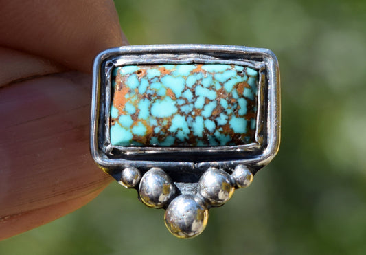 100% natural, rare spiderweb turquoise in a tasteful, small pendant.