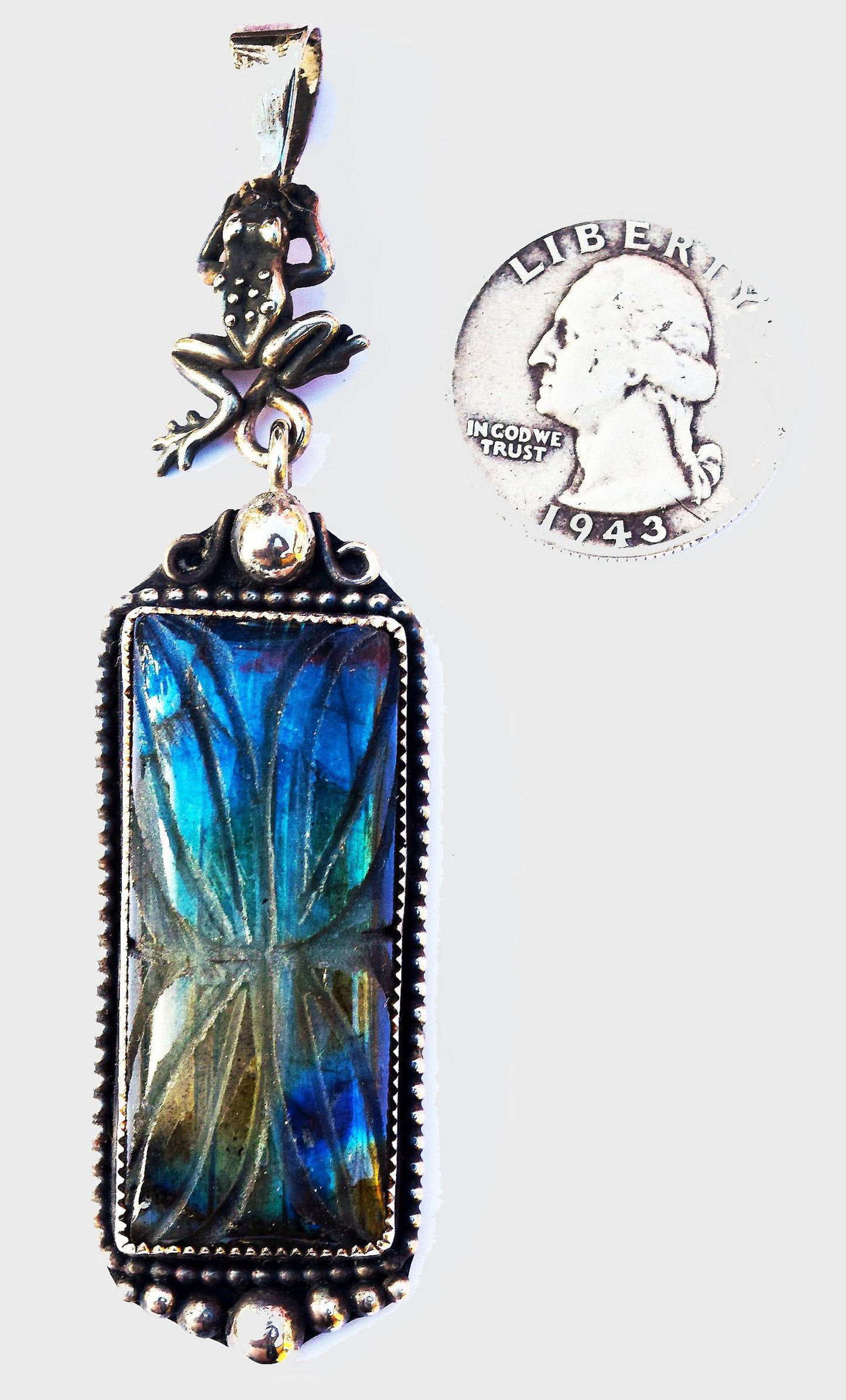 Bi-color Labradorite and sterling Silver handmade pendant.