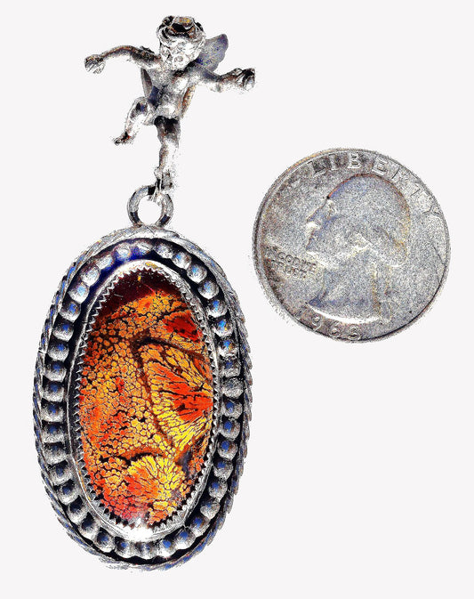 One of the rarest of agates, set in sterling silver, with a cherub to watch over it - and you!