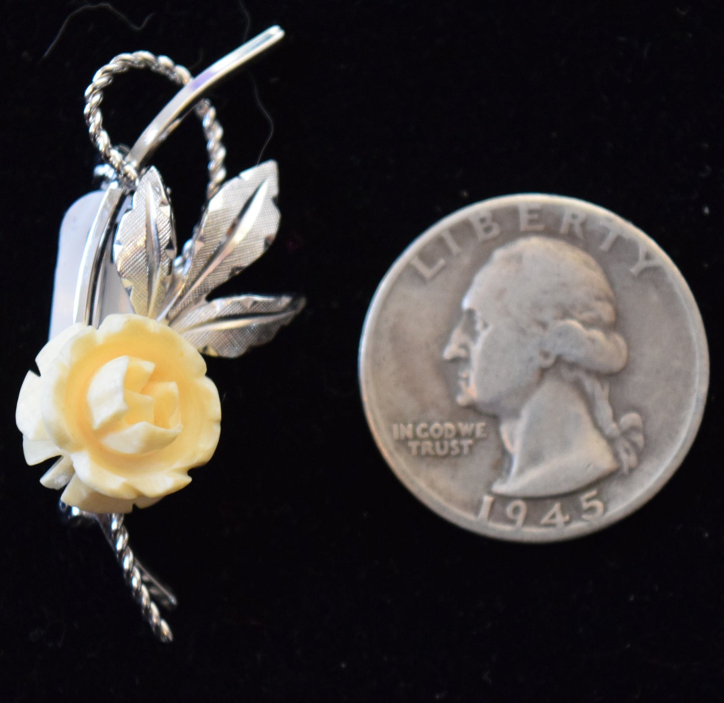 Delicate, vintage sterling silver floral pin with carved bone rose.