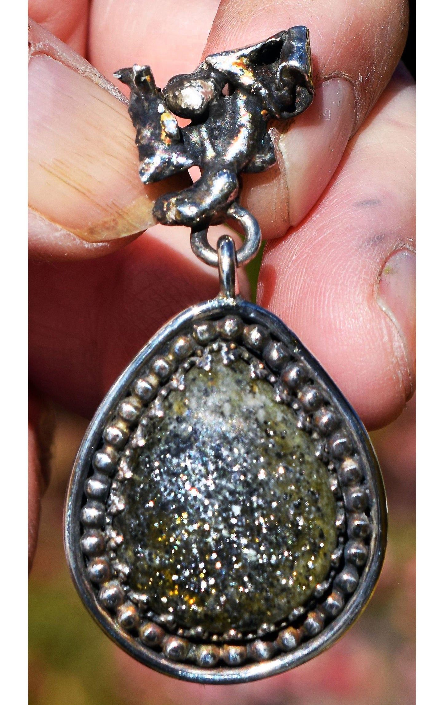 Iron pyrite crystals sparkling in agate, mounted in Sterling Silver.
