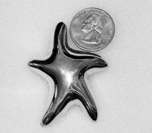 Silly sterling silver star. A pendant, a pin. So MANY options!
