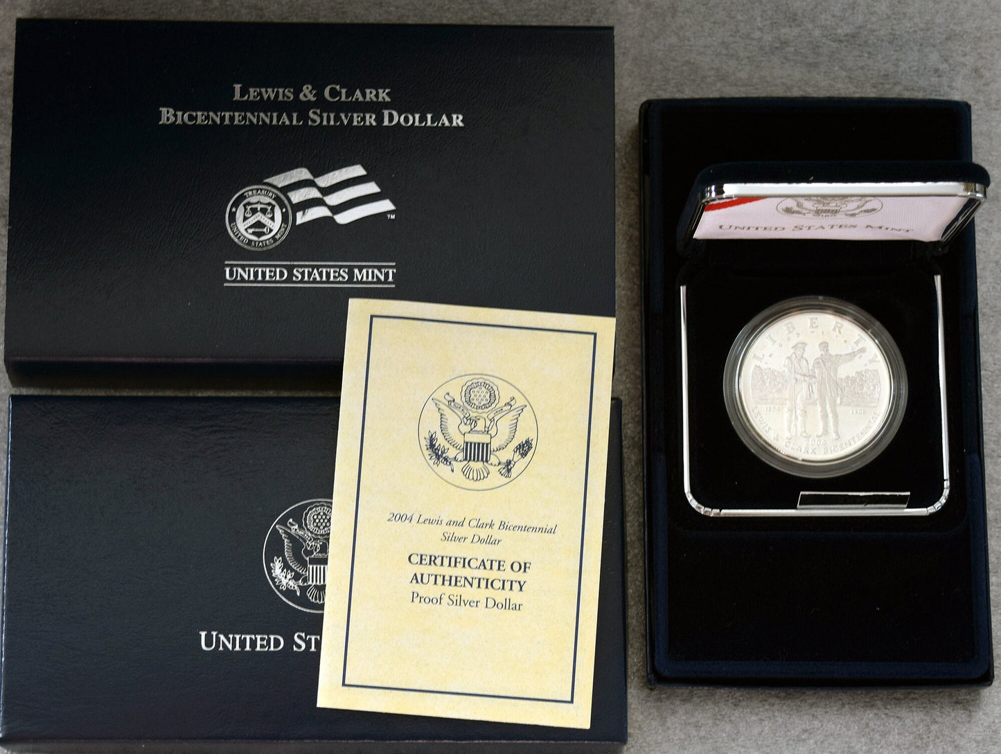 2004 PROOF Silver Dollar with original packaging and COA