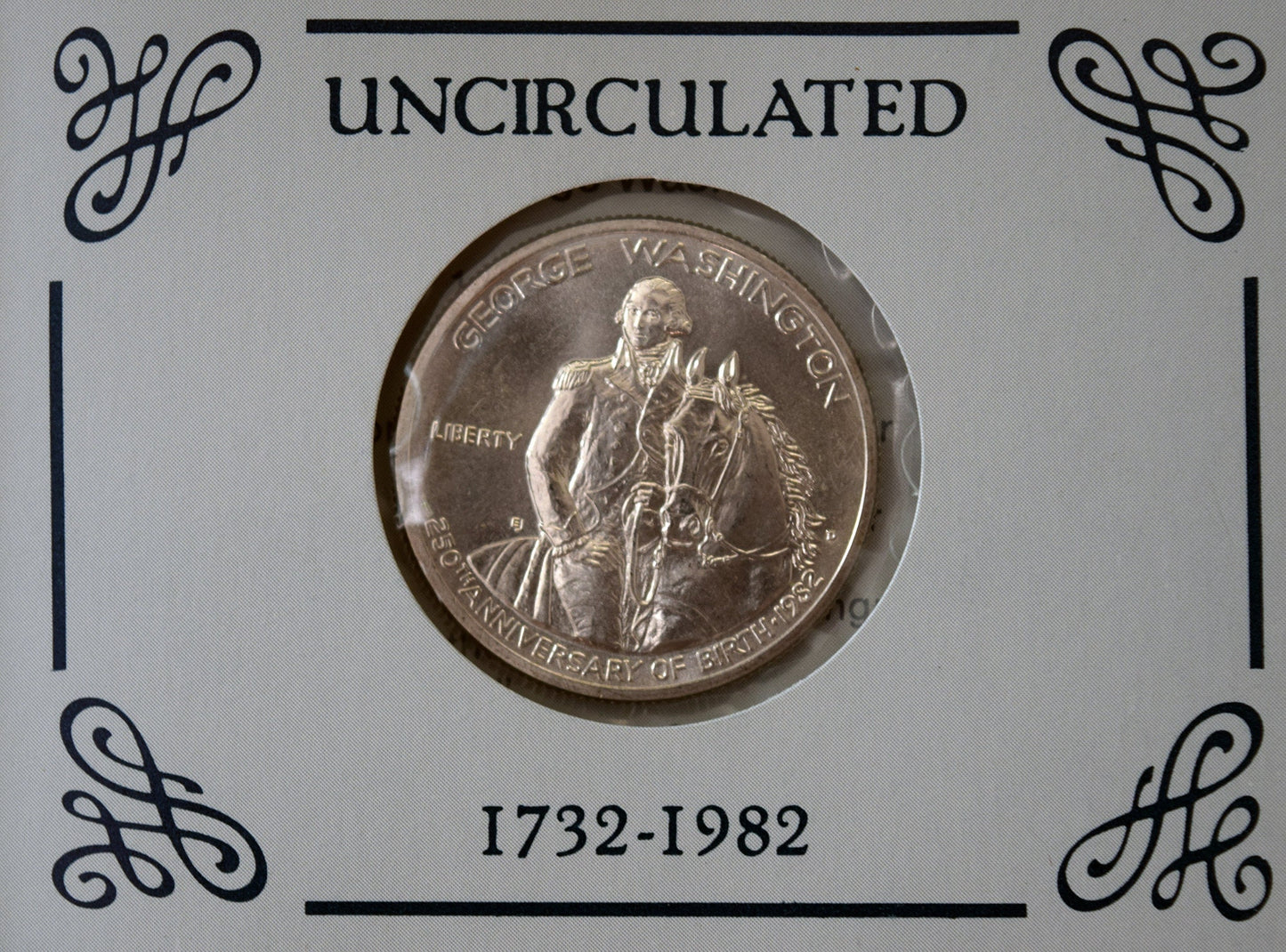 1982 Uncirculated Washington Half-Dollar, with original packaging and COA