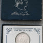 1982 Uncirculated Washington Half-Dollar, with original packaging and COA