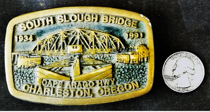 Construction project commemorative brass belt buckle. Number 177/1000, South Slough Bridge, Oregon, 1991