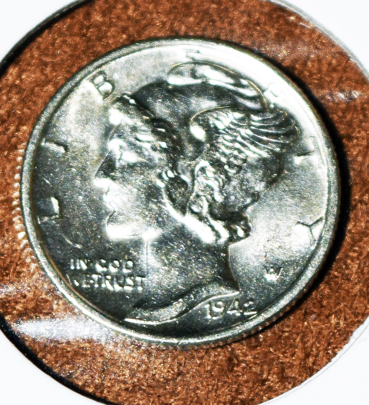 Brilliant, uncirculated 1942 P silver mercury dime