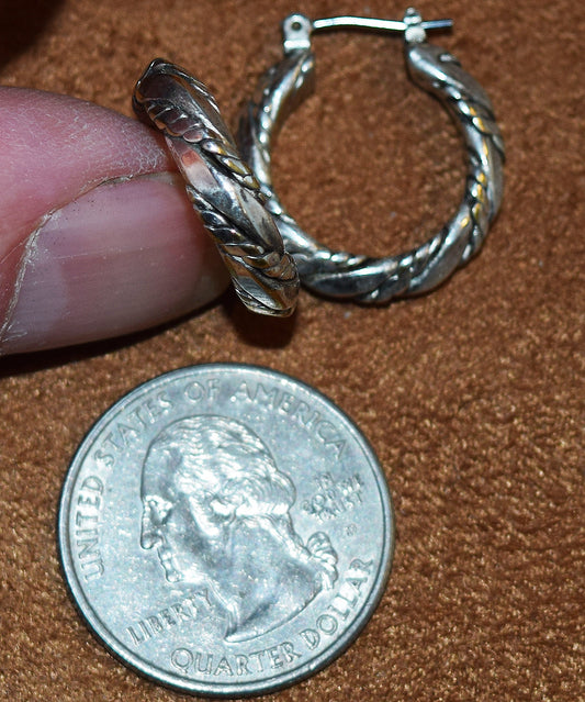Vintage solid hoop Sterling Silver earrings with a twist!