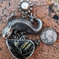 A large lazy lizard languishes under the summer?s desert sun. Sterling pendant with Rutilated Quartz by Mani Pureheart!
