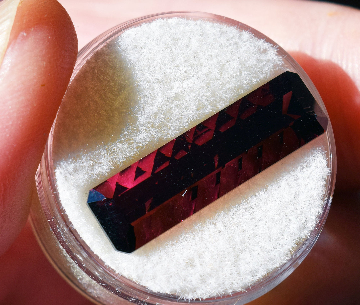 Rare red Tourmaline (Rubellite) from Nigeria.  Concave cut masterpiece.  5.68 carats of heaven!